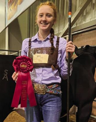 Wellington Junior High School eighth-grader Bailey Page wins second place with her medium weight black cross steer “Petey” at the San Angelo Stock Show and Rodeo. She also placed sixth with “Dexter” in the light weight all other crosses (AOCs).