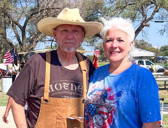 Justice of the Peace Cliff Waller, left, and Justice of the Peace Court Clerk Debbie Huntress garner second place in the Living History Chili Cookoff at Powell Park. A community service project, the duo donated their proceeds to Hearts United Give Support (HUGS), the cancer support organization for Collingsworth County residents.