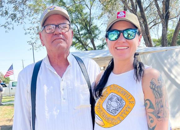 The father-daughter team of Jody Coleman, left, and Taylor Coleman earn third place in the Chili Cook Off Saturday, Oct. 4.