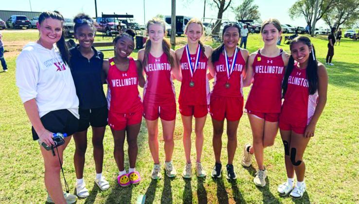The Wellington Lady Rockets will compete at the Region 1 Cross Country Championships Monday, Sept. 21 at Mae Simmons Park in Lubbock. From left: Coach Savannah Henderson, Angela Lewis, Aleah Lewis, Addalyn English, Taytum Kane, Leslie Orozco, Anna Henard, Sabrina Segovia. Courtesy Photos
