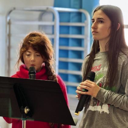 Monson Music Studio’s Bella Blu Sanders and Saylee Ochoa perform holiday selections at Childress Healthcare Center Friday, Dec. 20.