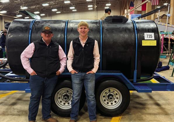Childress High School Future Farmers of America (FFA) members Jacob Renteria and Keegan Sides present a 1,000-gallon water trailer at the Fort Worth Stock Show and Rodeo Junior Agricultural Mechanics Project Show Friday, Jan. 17-Sunday, Jan. 19 in Fort Worth, earning a blue ribbon. At the competition, over 400 projects were shown by 1,660 students from 220 schools.