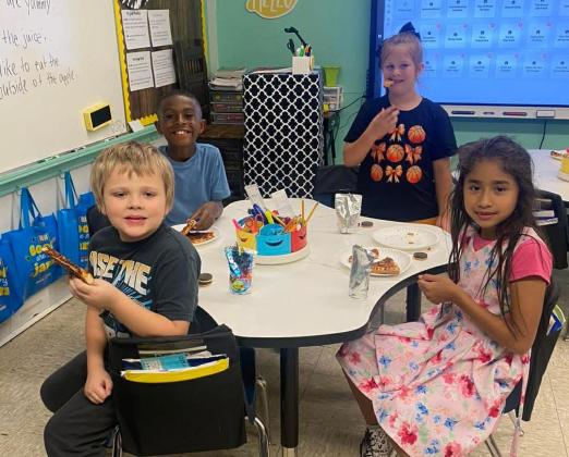 Second Grade won the Penny Wars and got a pizza party.