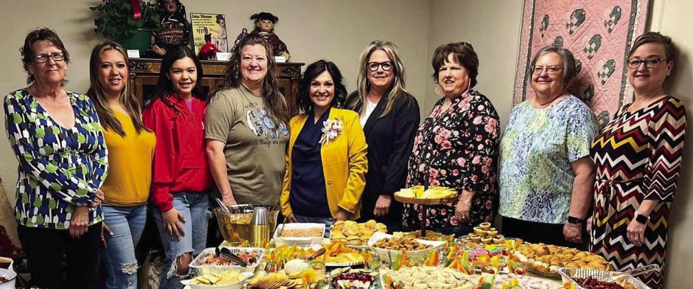 In honor of Wellington Professional Women’s Club Woman of the Year Becky Reyes, members, including Glenda Anglin, left, Kasey Rodriguez, Kaycee Martinez, Carrie Martinez, Reyes, Vikki Barton, Candy Powell, Cheryl Tarver and Alicia Parks, pause prior to Tea for Me Friday, April 21 in the Ellis Art Center of the Collingsworth County Museum. Courtesy Photo
