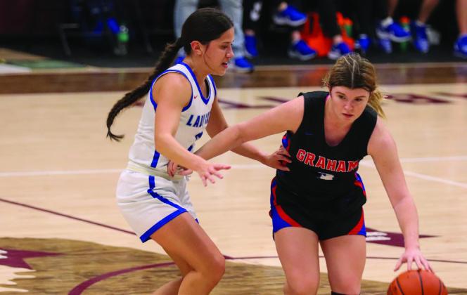 The Childress Bobcats and Lady Cats recently hit the court with the Lady Cats competing in the Bowie Tournament Monday, Nov. 20-Tuesday, Nov. 21, while the Bobcats took on the Quanah Indians Tuesday, Nov. 21. Through the Lens of Liz/Elizabeth Oronia