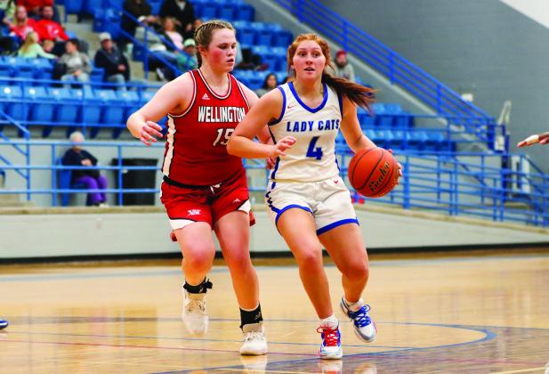 Hitting the court Tuesday, Nov. 15, the Childress Lady Cats picked up a second consecutive win. This time against the Wellington Lady Rockets in a slim 48-44 triumph. For additional photos, see 4B. Photo by Shadin Zuber