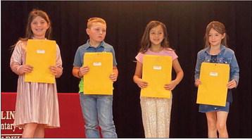 Courtesy Photos Debbie George’s second graders accepting A Honor Roll, Perfect Attendance and American Citizenship awards are as follows. From left: Callahan Cantu, A Honor Roll, American Citizenship; Joe Lemons, A Honor Roll, Perfect Attendance; Sophia Manuel, A Honor Roll; Peyton Roberson, A Honor Roll, American Citizenship.