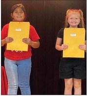 Becky Lampe’s second graders accepting Most Improved awards are as follows. Left: Audrina Gonzales, Most Improved; Aubree Richard, Most Improved.