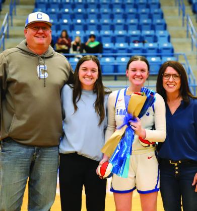Childress Lady Cat basketball player Cameran Daniel with sister Corbin Daniel and parents Doug and Lynn Daniel.