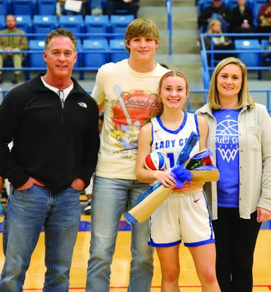 Childress Lady Cat basketball player Kate Taylor with brother Seth Taylor and parents Kevin and Allison Taylor.