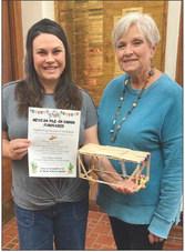 Felicia Sanford, left, presents a program on the Boy Scouts and Girl Scouts of America at the recent Modern Home Club meeting. The club, including Modern Home Club member Susan Keener, right, approved a donation of $100 to local scouts.