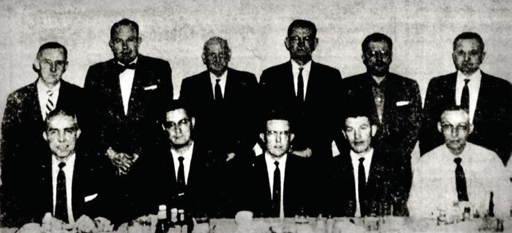 The Memphis Chamber of Commerce Board of Directors and Hall County Board of Development meet to lay groundwork for committee meetings. Front row, from left: Ed Foxhall, President A. L. Gailey, Les Sims, Dick Fowler, W. A. Smithee. Back row, from left: Manger Clifford Farmer, Tony Craig, O. E. Bevers, J. W. Coppedge, Dr. D. H. Aronofsky, Joyce Webster.