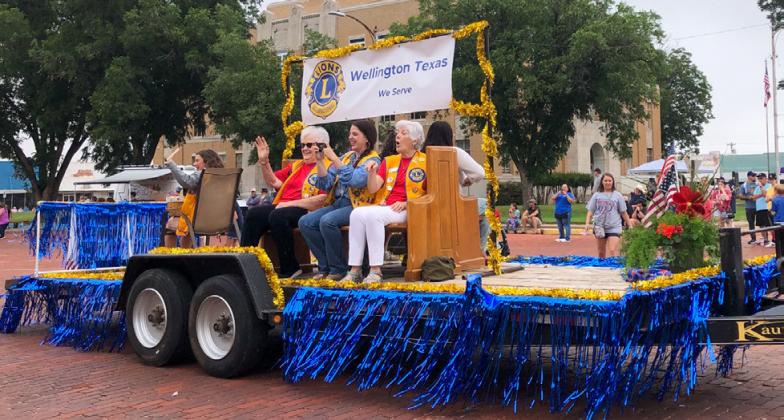 The first parade since 2018, members of Wellington Lions Club and the Rockets Leo Club designed an entry for the Wellington Fourth of July Community Parade on Saturday morning, July 5. From left: Sweetheart Treylea Wiebe, Nancy Harris, Amy Henard, Linda Powell. Leos on the opposite side included Ava Garcia. The Red River Sun/Bev Odom