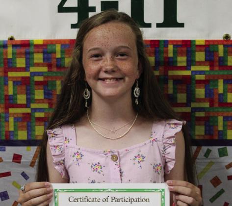 Jentry Souder participated in Consumer Education, Fashion and Interior Design, Promote 4-H and Shooting Sports – Archery and was Junior High Club Secretary. Not pictured are Colee Cox, who participated in Consumer Education, Horse, Meat Science and Swine; Emily Dominguez, who participated in Food and Nutrition, Photography and Rabbits; Max Rabe, who participated in Beef Cattle; and Tripp Tippett, who participated in Consumer Education, Meat Science, Rabbits and Shooting Sports – Rifle and Shotgun.