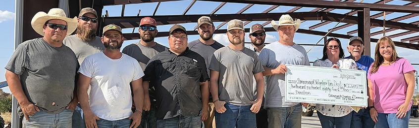 Front, left: Samnorwood VFD Firemen Chris Nevarez, Justin Ramos, and Ruben Nevarez, Captain Weston Wright, Chief Larry Wright, Chamber President Cindy Weatherly, Chamber Volunteer Billy Wilkerson, Chamber Vice President Cari-Anna Wynn. Back, left, Samnorwood VFD Captain Jerred Bentley, First Assistant Matt Tarver, Captain Dixon Conner, and Second Assistant Tucker Conner.