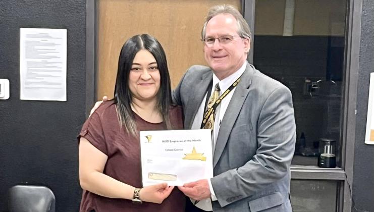 Memphis Independent School District (ISD) Superintendent William Alexander congratulates March Employee of the Month Cristal Garcia, an instructional assistant at Memphis Middle School. “These ladies show up each day to help our students grow,” Alexander said, and they make sure our kiddos know hwo much they matter.” The Memphis ISD Employee of the Month Program is sponsored by Memphis First Bank and Trust. Memphis ISD