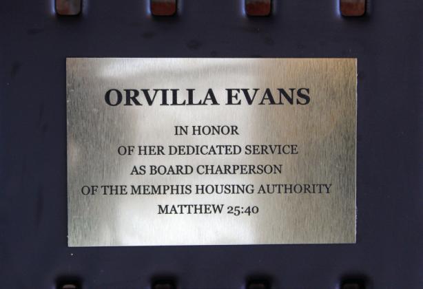 A bench, honoring the late Orvilla Evans, is placed at the Memphis Housing Authority. The bench reads “Orvilla Evans: In honor of her dedicated service as Board Chairperson of the Memphis Housing Authority. Matthew 25:40.”