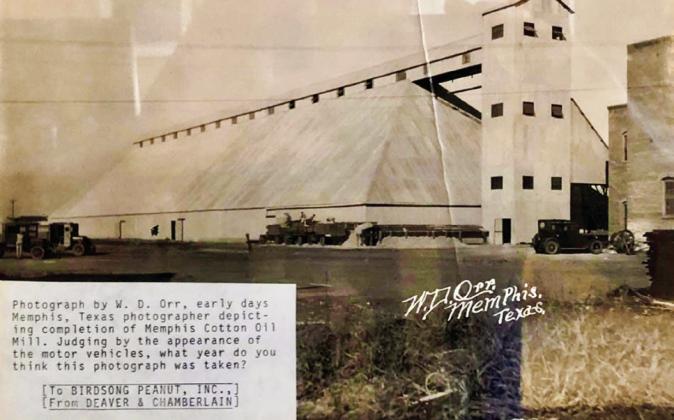 Photograph by W.D. Orr, an early days Memphis photographer, depicting completion of the Memphis Cotton Oil Mill. Judging by the appearance of the motor vehicles, what year do you think this photograph was taken?