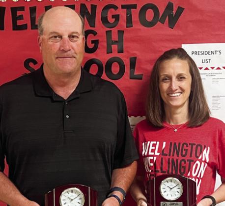 For 25 years of service, Kurt Ashmore, left, and Amanda Davis receive a Montreux desk clock.