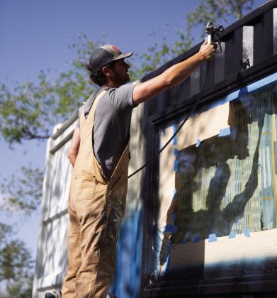 Nationally recognized muralist Matt Tumlinson paints Container 5 at Hotel Turkey. Photos Courtesy of Hotel Turkey