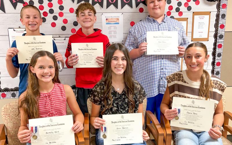 Sparklers garner citizenship, ‘Top 10’ awards Daughters of the American Revolution present Wellington Junior High School Youth Citizenship Awards to open the Wellington Junior High School 2026 Awards Assembly at 10 a.m. Monday, May 11. From left: sixth grade, Berkeley Ward, Jake Anderson; seventh grade, Quinn Roberson, Jeffery Fires; eighth grade, Claire Kane, Caleb Colson. BEV ODOM/THE GREENBELT INTREPID