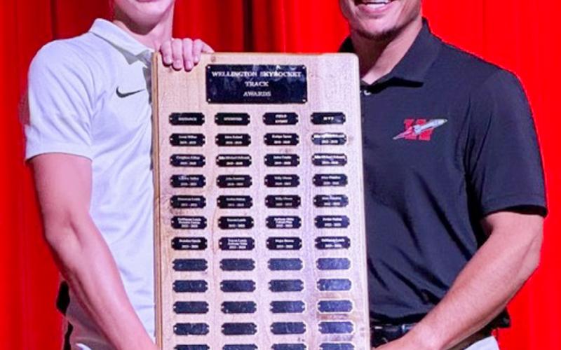 Wellington High School Freshman Damon Keys garners the Boys’ Track Distance Award, presented by Coach Jared Casas.