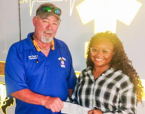 Hall County Emergency Medical Services (EMS) Paramedic Jace Frances awards Mikayla Ledbetter the David Eades Memorial Scholarship. A 2024 graduate of Memphis High School, Ledbetter’s mother, Lasonya McIntosh, has served with the Hall County EMS for over 22 years. Recently, Ledbetter graduated from Clarendon College, where she earned an associate’s degree. Next, Ledbetter plans to attend Covenant School of Radiology. HALL COUNTY EMS