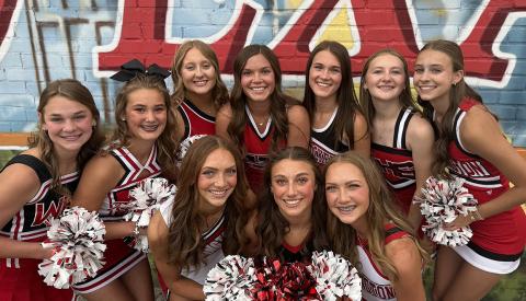 Cheering on the Wellington Skyrockets for the 2026-2027 school year are a spirited squad of 10 young women. Front row, from left: junior Tatum Kane, freshman Claire Kane, freshman Kaesyn Kane. Back row, from left: freshman Halle Hedrick, freshman Ava Kate Inman, senior Allie Duncan, senior Ceighley Killian, senior Maggie Tillman, sophomore Hartley Kane, sophomore Libby Chandler. COURTESY PHOTO