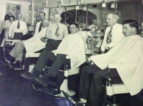 Popeye stands in the back of a photo taken at Greenhaw’s Barber and Beauty Shop in 1942. Photos Courtesy of the Collection of John R. Ballew