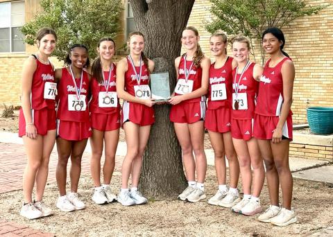 The Wellington Lady Rockets, including Anna Henard, Aleah Lewis, Claire Kane, Taytum Kane, Kaesyn Kane, Ava Kate Inman, Halle Hedrick, and Priscillia Marentes, take the Class 2A Region I preview championship at the recent Lubbock ISD Invitational. WELLINGTON HIGH SCHOOL