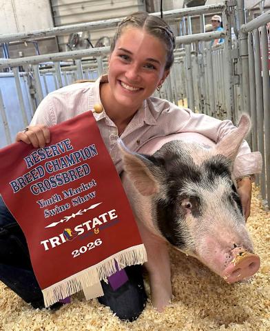Wellington High School senior Maggie Tillman, representing Wellington FFA, garners the Reserve Crossbred Breed Champion distinction at the Saturday, Sept. 19, Tri State Fair Swine Show. Tillman won her middle weight class and the middle weight division prior to advancing to the final round. WELLINGTON HIGH SCHOOL