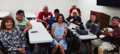 Guests Maria Ozuna, left, and Elva Ruiz Guajardo, Fred Peters, Wellington High School (WHS) Class of 1965, Lynn Fulcher, WHS Class of 1971, Linda Gonzales, WHS Class of 1971, Beth Peters Motsenbocker, WHS Class of 1971, LaJuanda Peters Ressel, WHS Class of 1967, guest Tonya Gonzales and Andy Gonzales, WHS Class of 1971, with Angel, gather at the Greenbelt Willie Room for fellowship and refreshments Friday, Aug. 5. See page 10A for additional WHS reunion photos. Courtesy Photos