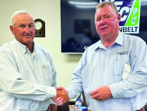 Greenbelt Electric Cooperative Board of Directors Vice President Stan Shelton, left, receives a 25-year pin from Chief Executive Officer Randy White during Greenbelt’s 85th Annual Membership Meeting Friday, Sept. 27 in Wellington. Photos Courtesy of Greenbelt Electric Cooperative