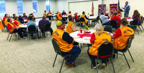 Guests and members of the Wellington Lions Club listen as District 2-T1 Lions Governor Chris Rogers describes district priorities at its Monday, Sept. 16 meeting The Red River Sun/Bev Odom