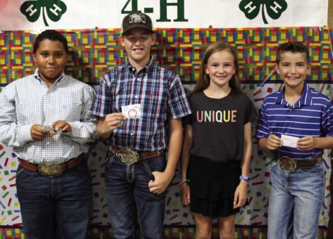 The Junior Meat Judging team of Bryson Session, left, Slade Chapman, Reagan Souder and Quay Bruce placed third at district.