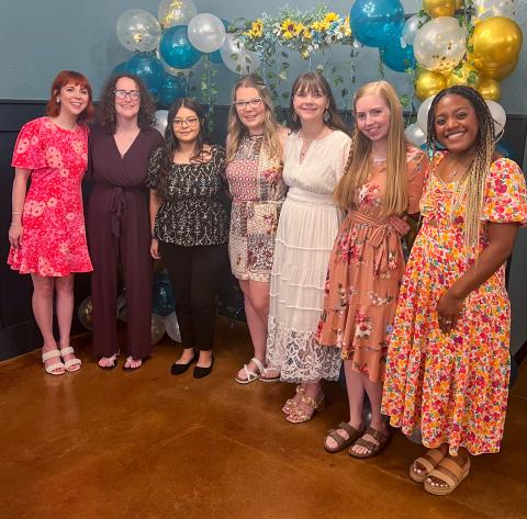 Wedding attendants and friends surround honoree Grace Kiker at her bridal shower on Saturday morning, June 7 at the downtown Wellington Lewis Building. From left: Victoria Kiker, Jalee Davis, Victoria Sanchez, Megan Manning, guest of honor Grace Kiker, Sarah Chadwick and Kira Mickens.  