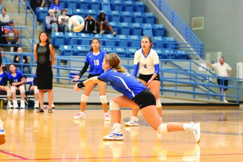 Childress’ Sophie Stephens(5)sends the ball over the net during the Lady Cats’ previous win over Dalhart. Photo Courtesy of Childress High School Yearbook Staff