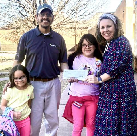 Ingevity Childress Chemical Plant employee Tony Lugo presents a check to Childress Elementary School Principal Tracey Blake. Funds will benefit the Childress Elementary School STEM lab, Blake said. Childress Elementary School