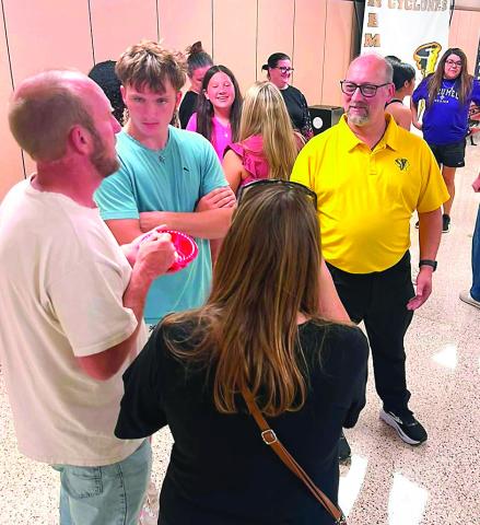 New Memphis High School Principal John Odgen (in gold shirt) met with students and parents Tuesday evening for a What’s The Scoop ice cream meet and greet. MISD PHOTO