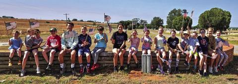 Collingsworth 4-H places cemetery flags