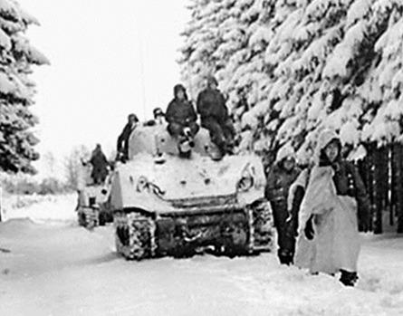 The 740th Tank Battalion, along with infantry, move in the winter weather to defend Stoumont, Belgium. Photos Courtesy of Floyd Killough Collection