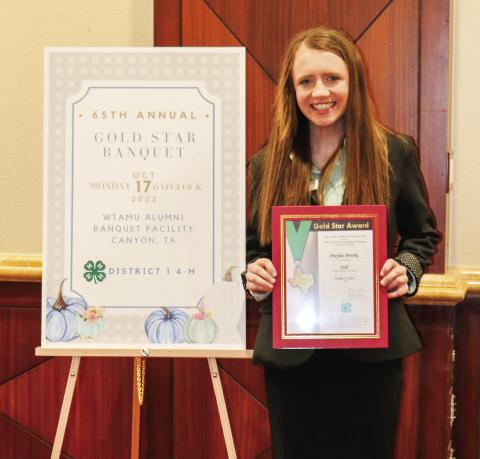 Hall County 4-H member Braylee Brooks earns the Gold Star Award, the highest achievement given by the Texas 4-H Youth Development Program, at the 65th Annual District I 4-H Gold Star Banquet Monday, Oct. 17 at the West Texas A&amp;M University Alumni Banquet Facility in Canyon. Photo Courtesy of Hall County 4-H