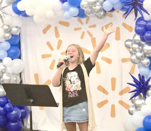 Monson Music Studio’sWillis performs at Walmart grand re-opening