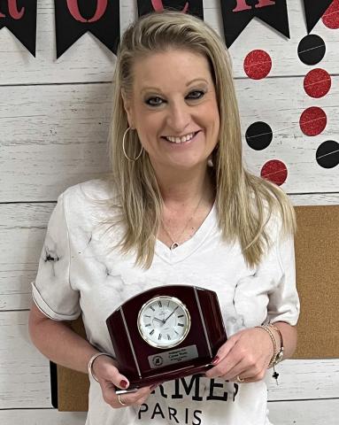 During an end-of-the-school-year employee breakfast Friday, May 16, Wellington Independent School District Superintendent Kurt Ashmore acknowledged staff with 2024-2024 service awards. For 25 years of service, Czrena Watts accepts a Montreux desk clock. Wellington Independent School District