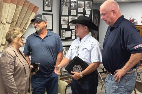 Texas House District 88 State Representative Ken King chats with constituents, including Collingsworth County Republican Party Chairperson Shari Bellizzi-Davis, Farris Nation, and Chad Holland, following the Wednesday, Sept. 23 Town Hall meeting at Collingsworth County Museum. INTREPID PHOTO / BEV ODOM