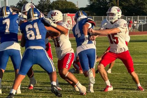 Saluting the USA on 9/11, Skyrockets Lawson Inman (11), Kyler Keys (15), and the entire defensive line holds Sunray to 167 total yards in Wellington’s 46-12 win on Friday, Sept. 11 on the road against the Sunray Bobcats. NEWS CHANNEL 10