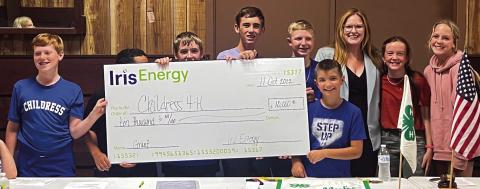 Childress County 4-H club officers accept a check in the amount of $10,000, which was granted through the Iris Energy Community Grant Program and presented by Iris Energy Community and Employee Relations Manager Nicole Dill at the recent Childress County 4-H meeting Tuesday, Oct. 11 at the Fair Park City Auditorium. For more, see page 7B. The Red River Sun/Nicole Dill