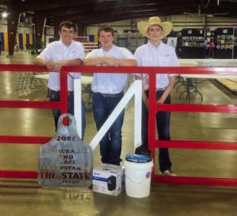Childress High School’s Kaden Chapman, Tuck Detwiler and Tripp Tippett recently compete at the Tri-State Fair and Rodeo Ag Mechanics Show Friday, Sept. 13 in Amarillo. Winning second-place sweepstakes, the trio received a first-place class win on an entry gate, while Detwiler received a first-place class win on his individual entry of a coffee table. Courtesy Photo