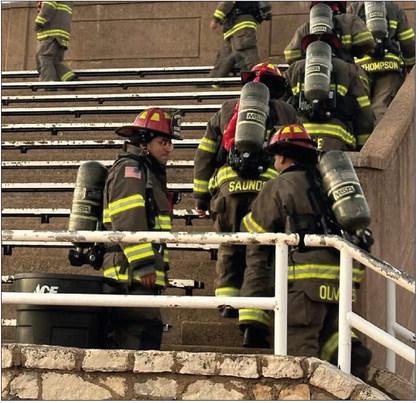 Childress firefighters climb the steps at Charlie Johnston Field on September 11 to mark the 25th anniversary of the terrorist attacks on America and the first responders who died that day. PHOTO BY MARKIA WILLIS