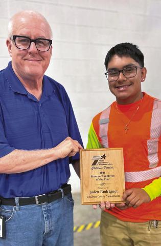 TxDOT Childress District Engineer Darwin Lankford recognizes Childress High School senior Jaden Rodriguez during National Intern Day recently.
